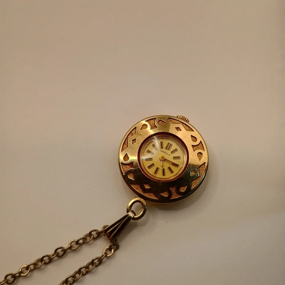 Caravelle Gold Toned Pendant Wind Up Watch